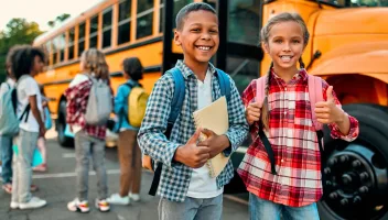 Children near school bus Children near school bus
